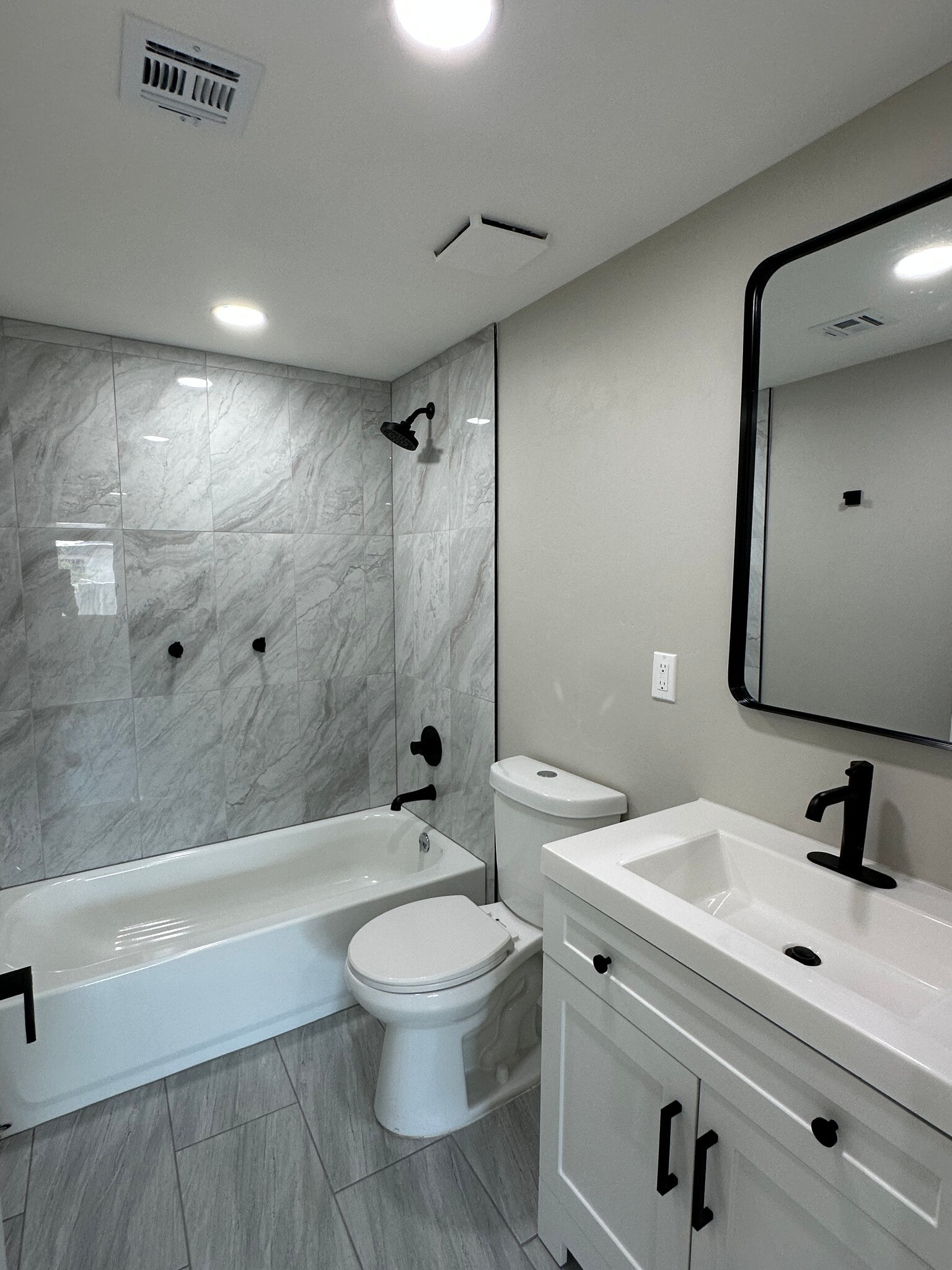 Modern main bathroom with custom fixtures and designer hardware - 1331 W Speedway Blvd