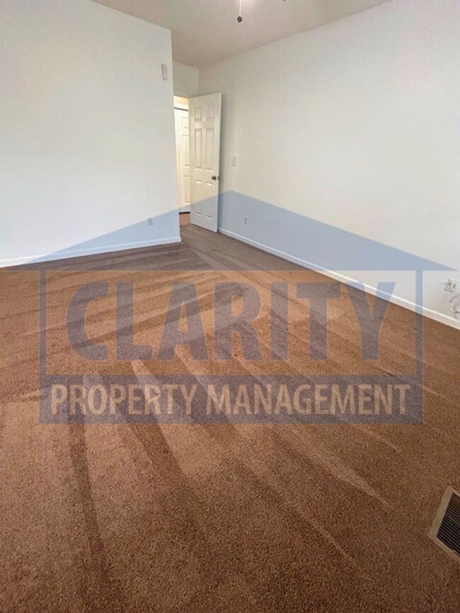 Building Photo - Three bedroom with attached garage!