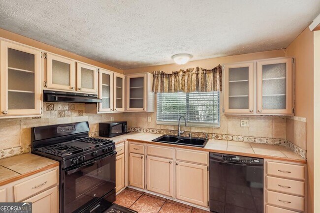 Building Photo - 6134 Raintree Bend