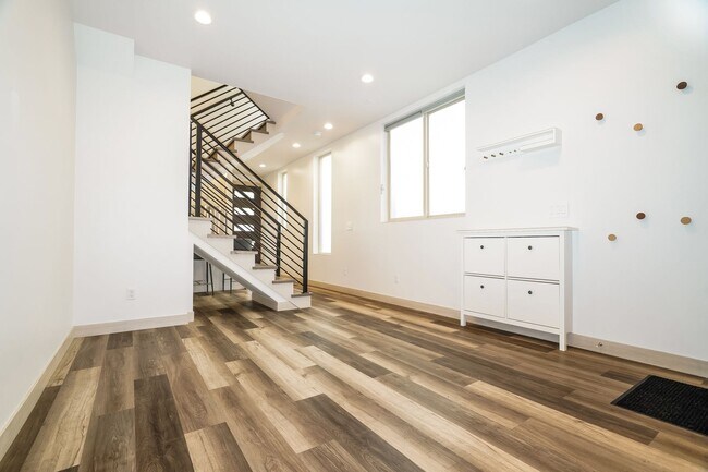 Building Photo - Stylish 3 Bedroom with Rooftop Decks and Dedicated Parking