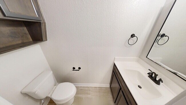 Building Photo - Welcome home to this beautifully designed 4-bedroom, 2.5-bathroom gem!