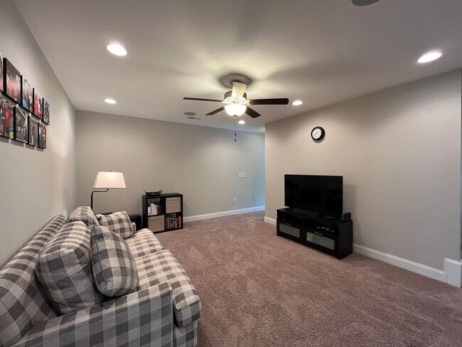 Building Photo - Exceptional 4BD, 2.5BA Cary Townhome with 2-Car Garage, Bonus 2nd Floor Living Space, and Private...