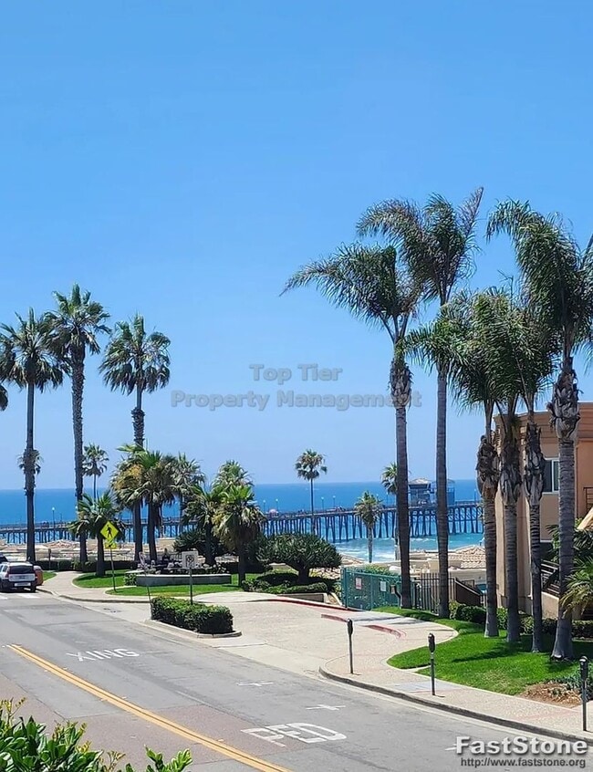 Building Photo - OCEAN VIEWS! Luxury Oceanside Condo with Stunning Pier Views | 2 Bed, 2 Bath, Secure Parking (2 s...