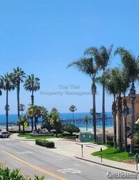 Building Photo - OCEAN VIEWS! Luxury Oceanside Condo with Stunning Pier Views | 2 Bed, 2 Bath, Secure Parking (2 s...