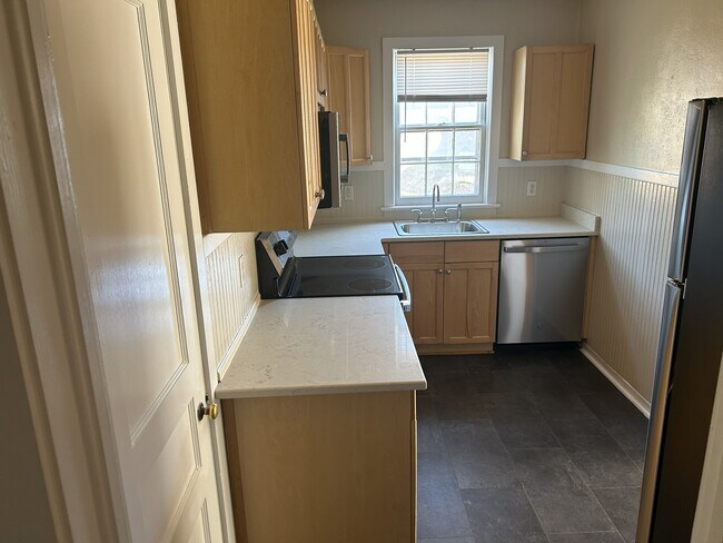 Kitchen window and new dishwasher - 208 Circular Rd