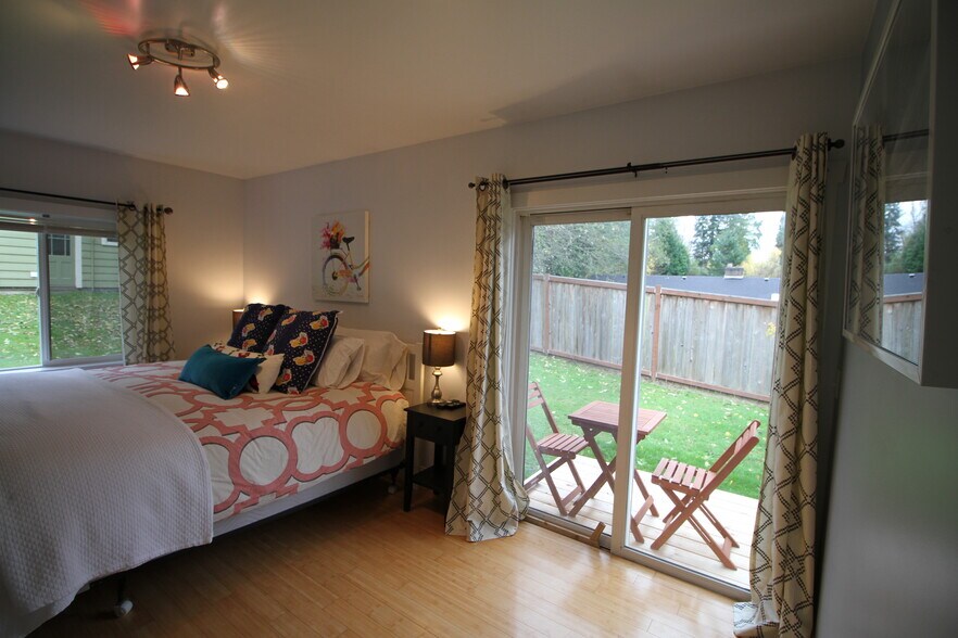 Bedroom #2 with king size bed, walk-in closet and patio - 1058 Central St SE