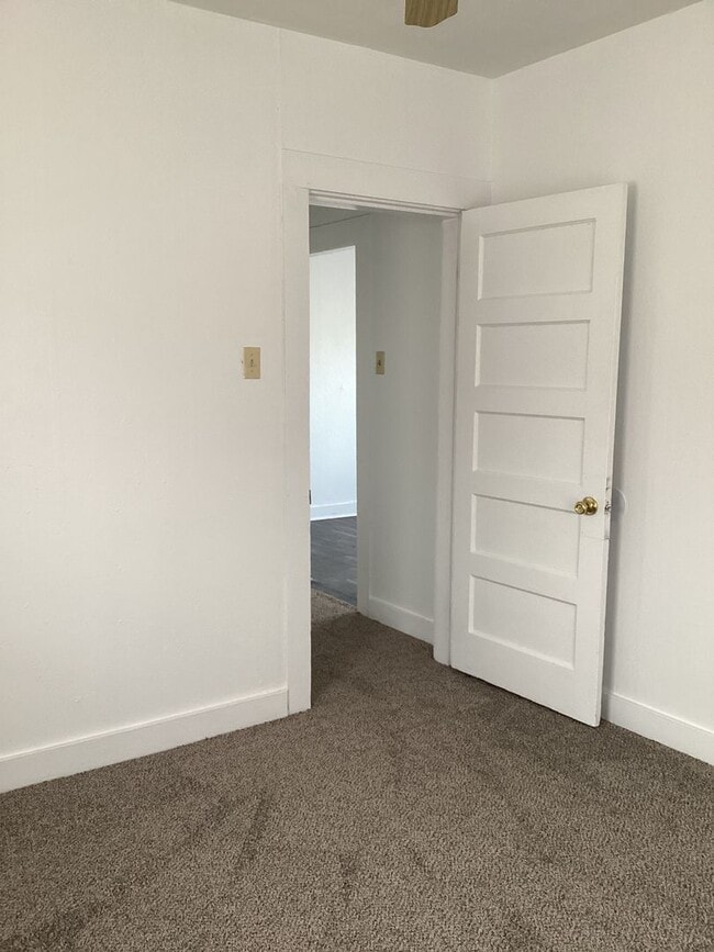 Building Photo - Freshly painted rooms in cute 2 bedroom home on quiet street!  Pets welcome!
