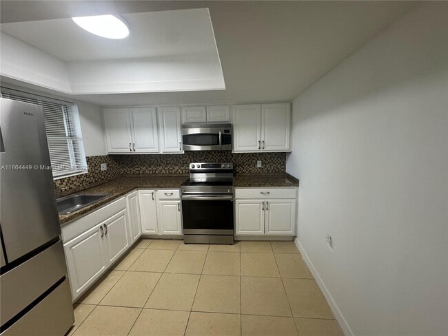Primary Photo - $2,500MONTHLY;11930 NE 19TH DR #16 NORTH M...
