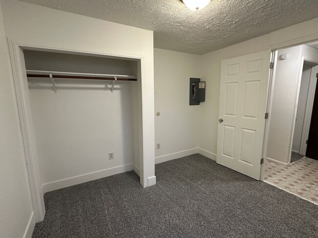 Building Photo - Spacious, three level, 4 Bed 2.5 bath Townhome in Ammon right behind the Walmart on Hitt.