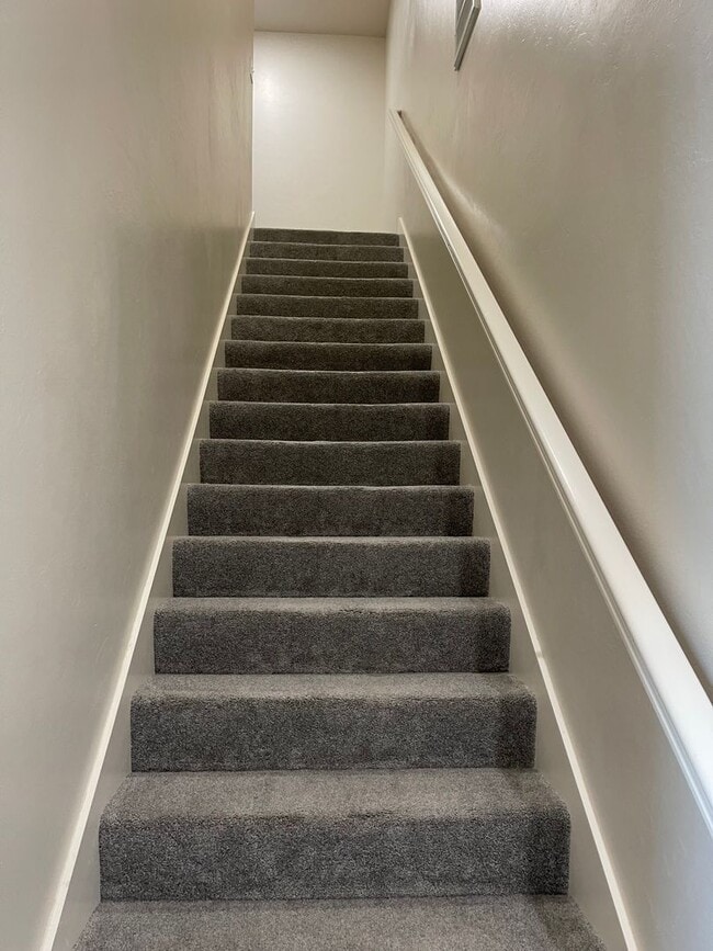 Building Photo - *Fully Furnished* 4 bedroom, 2.5 bathroom, 2 car garage Gated Neighborhood