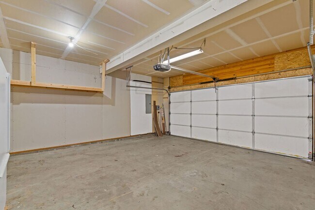 Building Photo - SPACIOUS LAYOUT! HARD SURFACE FLOORING, FENCED YARD & LARGE PATIO!