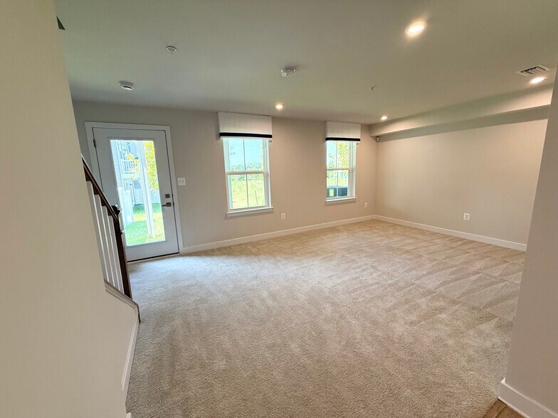 Spacious den with powder room on the first floor - 7841 Blackbriar Way