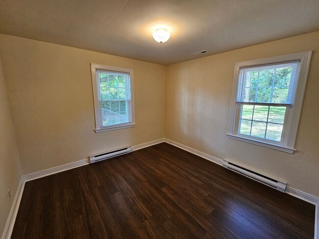 Building Photo - First Offering - 4BR/2BA Brick Cape Cod - ...