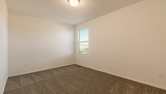 Building Photo - New ST FE Town Home