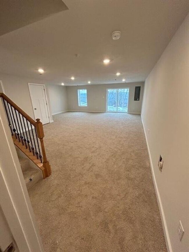 Building Photo - Luxury 4-Bedroom Townhome with Finished Walkout Basement & River Views