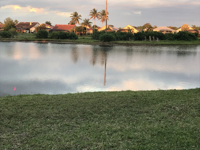 view from back water and golfing - 9856 Costa Mesa Ln