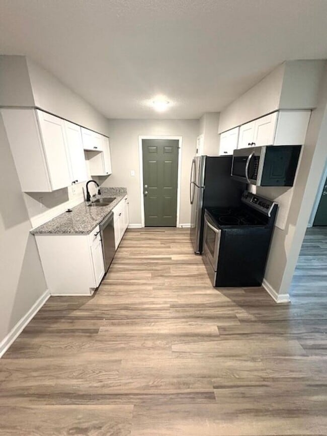 Building Photo - Live by UofM: Updated 1BR Apartment with W...