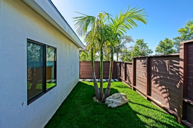 Building Photo - Beautifully Remodeled, Bright & Modern 4BR3BA Home w/ 2BR1BA Guest House On Sprawling Corner Lot ...