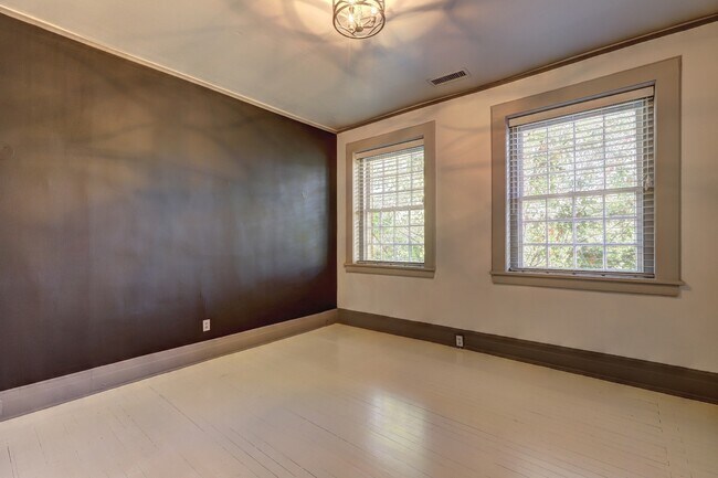 Spacious bedroom with wall of windows - 1 S Prado NE