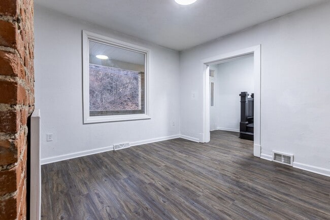 Building Photo - AVAILABLE APRIL - Open Concept 3 Bedroom Home w/ Character Throughout!