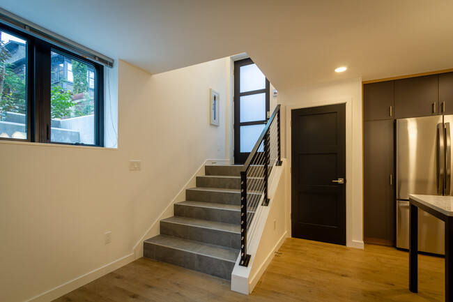 Gracious entry with wide stair to unit - 625 Malden Ave E