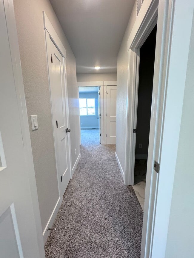 Building Photo - Sage Meadows II Townhomes — Lakeside Living Meets Modern Comfort!