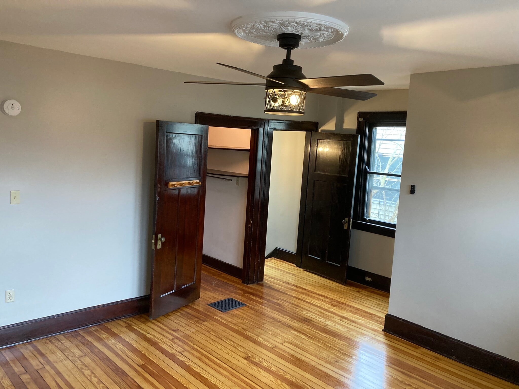 Bedroom features ceiling fan - 1122 Holman Ave