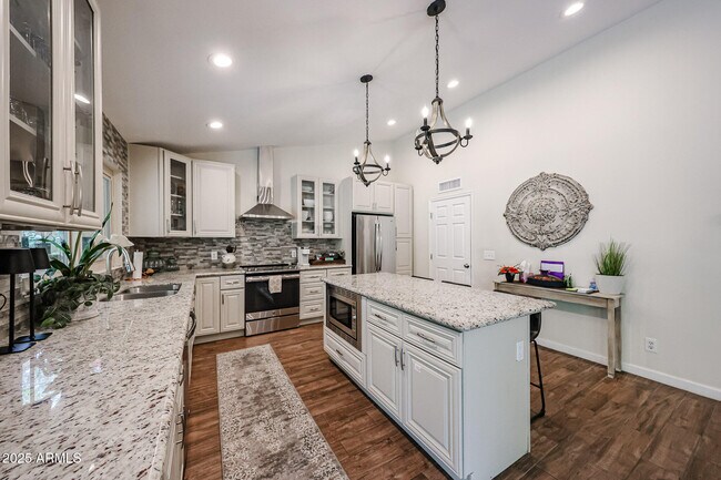 Building Photo - 9085 E Windrose Dr