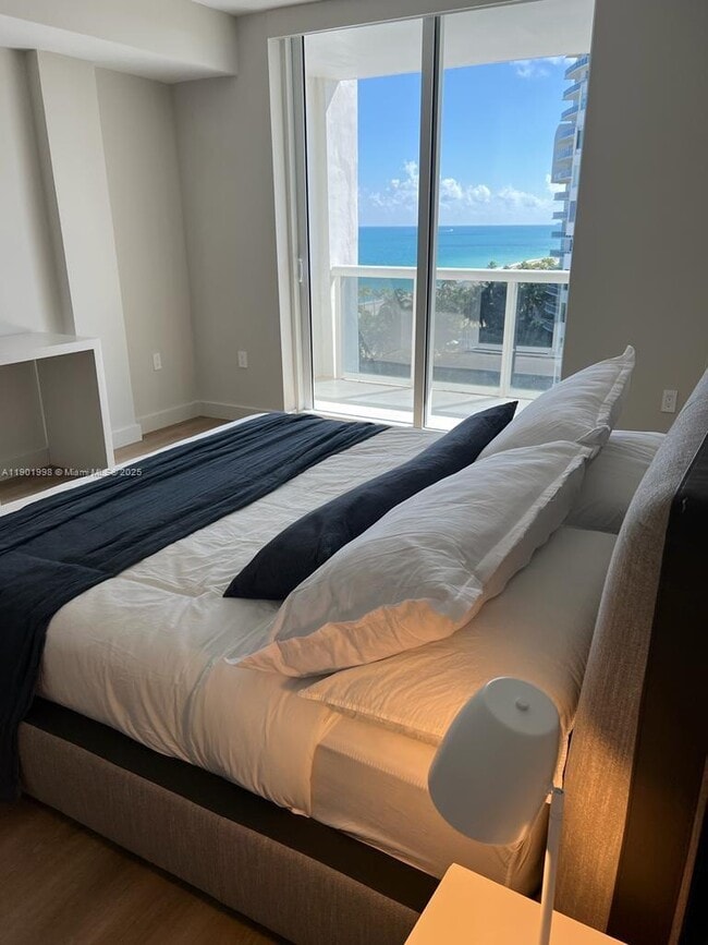 Building Photo - 10275 Collins Ave