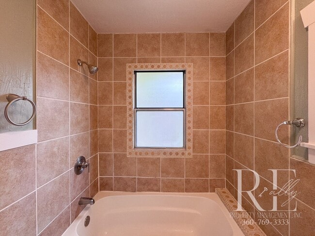 Building Photo - Charming Upper Unit with Modern Kitchen, Wraparound Layout & Walkable to PSNS