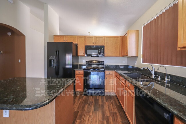 Building Photo - 8070 N Wild Aster Way