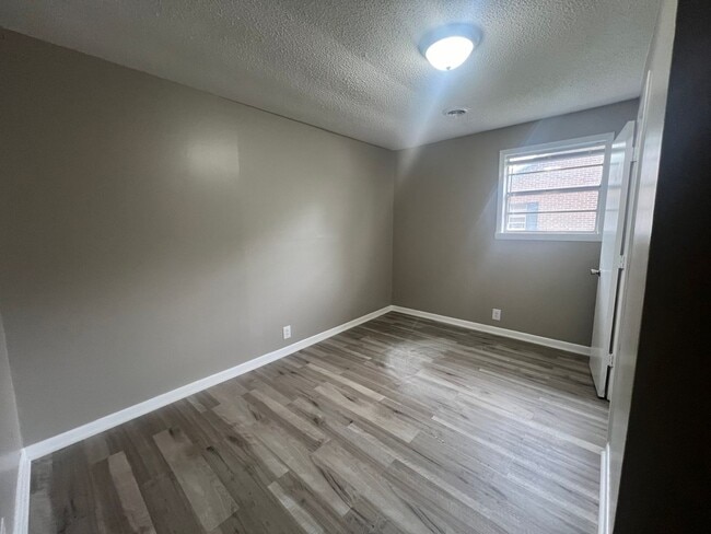 Building Photo - Three bedroom home with XL garage!