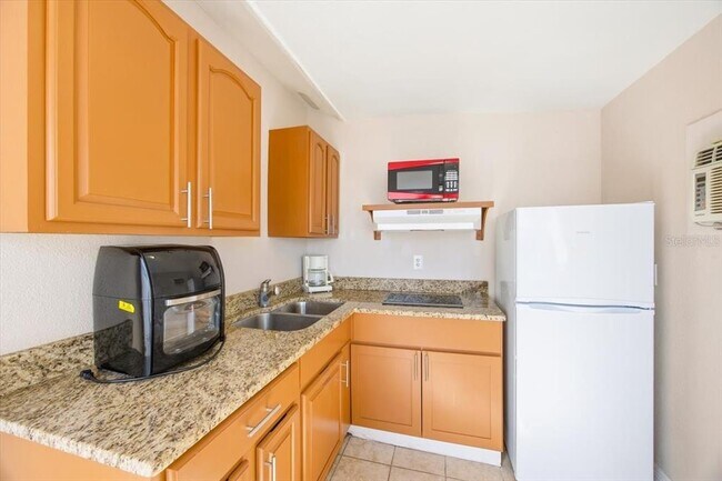 Building Photo - 5681 Tulip Ave