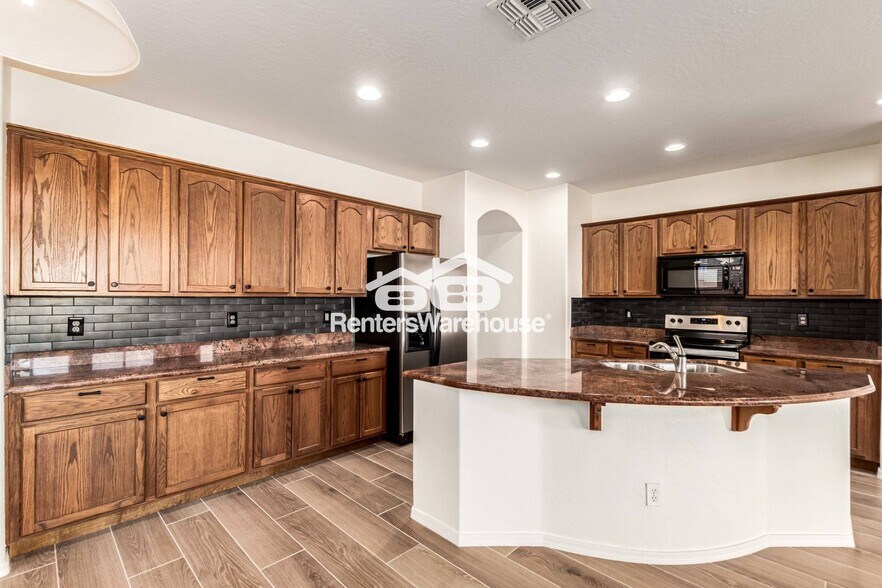 Building Photo - 12018 W Vernon Ave