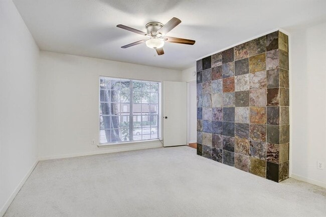 Building Photo - Beautifully remodeled two-story condo in a...