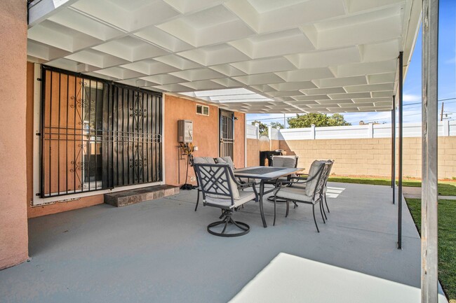 Building Photo - Stunning Remodeled Corner-Lot Home – An En...