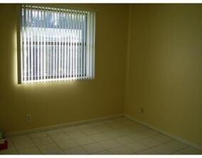 Building Photo - 11458 Royal Palm Blvd