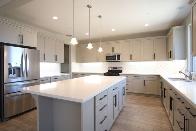 Building Photo - Available now! Beautiful Newer Home in Man...