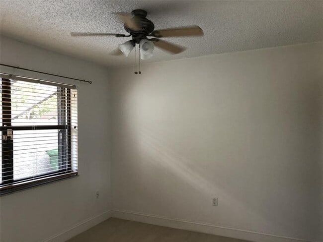 Building Photo - 9800 NW 16th Ct