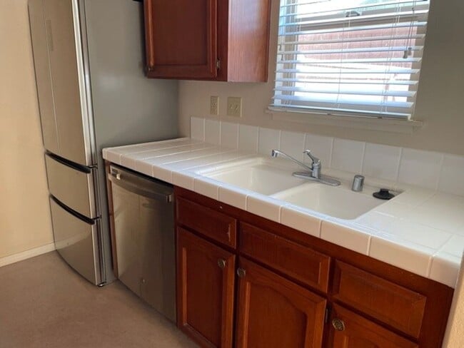 Building Photo - "Coming Soon" Awesome corner 2 Bedroom 2 Bath Townhome with large private patio (AC/Pool/Gated Pa...