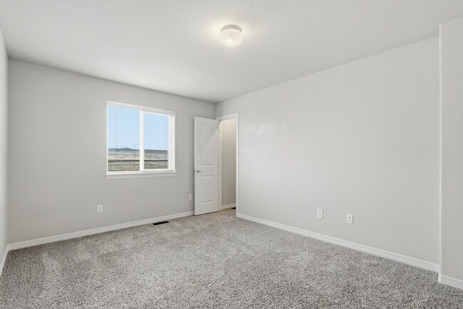 Building Photo - $2,240.95, 3 bed, 2.5 bath located in Colorado Springs with a large backyard.