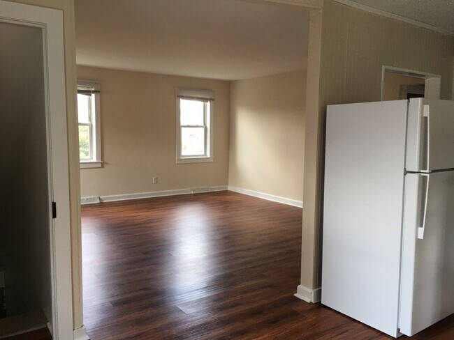 View from dining room into living room - 6004 Old Capitol Trl