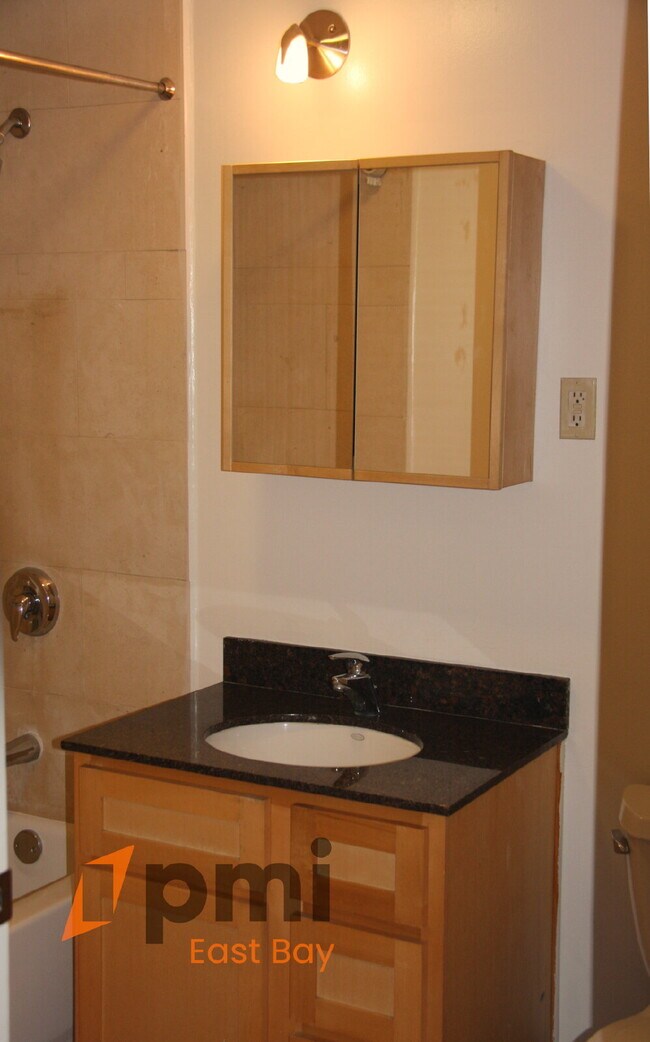 Building Photo - Bright Industrial-Style Loft in a Converte...