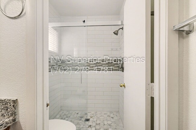 Building Photo - NW!! 4 Bedrooms!!! All Tile and Pergo flooring T/O!! NO Carpet!!! Low Maintenance Desert landscap...