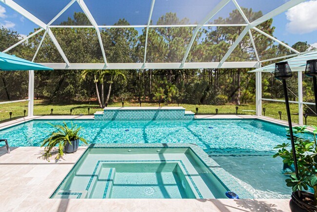 Building Photo - Lakeside Luxury Home With Pool in Reflecti...