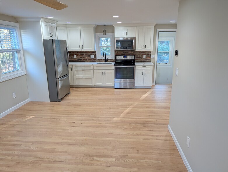 View into kitchen from living area - 63 Buttles Rd
