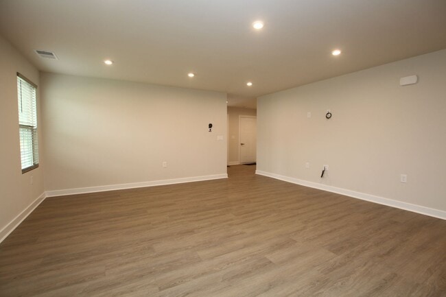 Building Photo - Maintenance Free Living in this Brand New ...