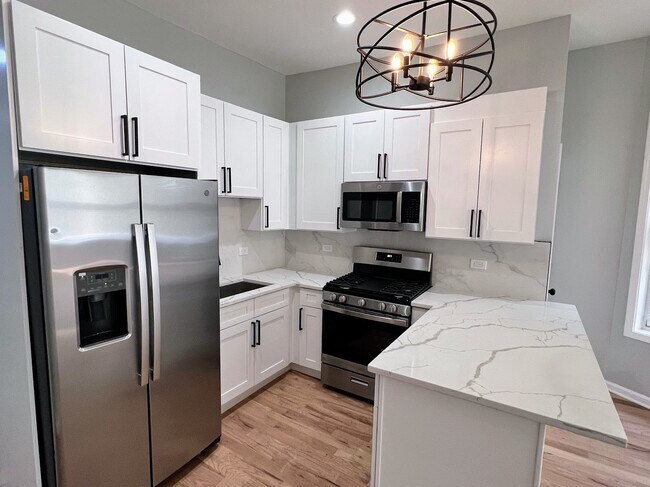 Building Photo - 1227 S Springfield Ave