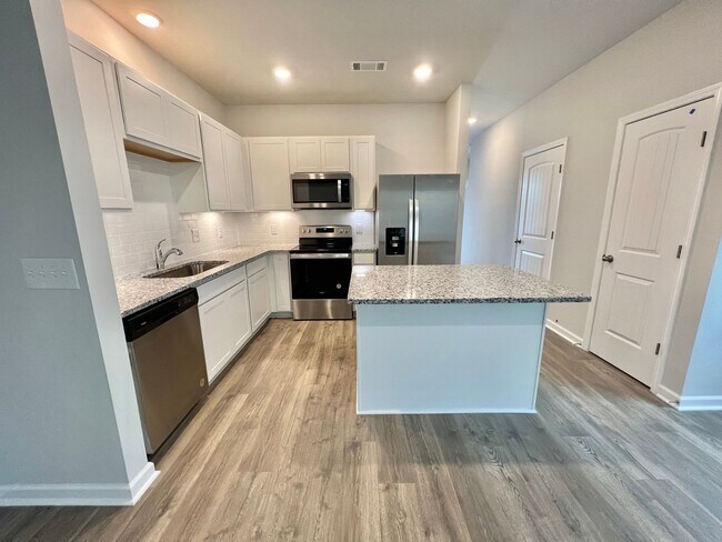 Building Photo - New 3 Bedroom, 2.5 Bathroom Townhouse w/ C...