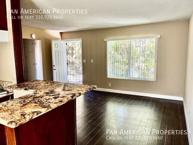 Building Photo - Upstairs One Bedroom Available For Immedia...